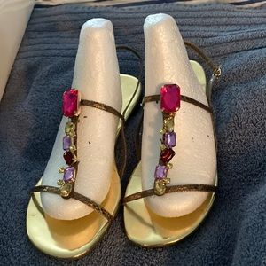 Nine West sandals. Size 9 1/2 medium. Like new. Bronze straps/jeweled stones.
